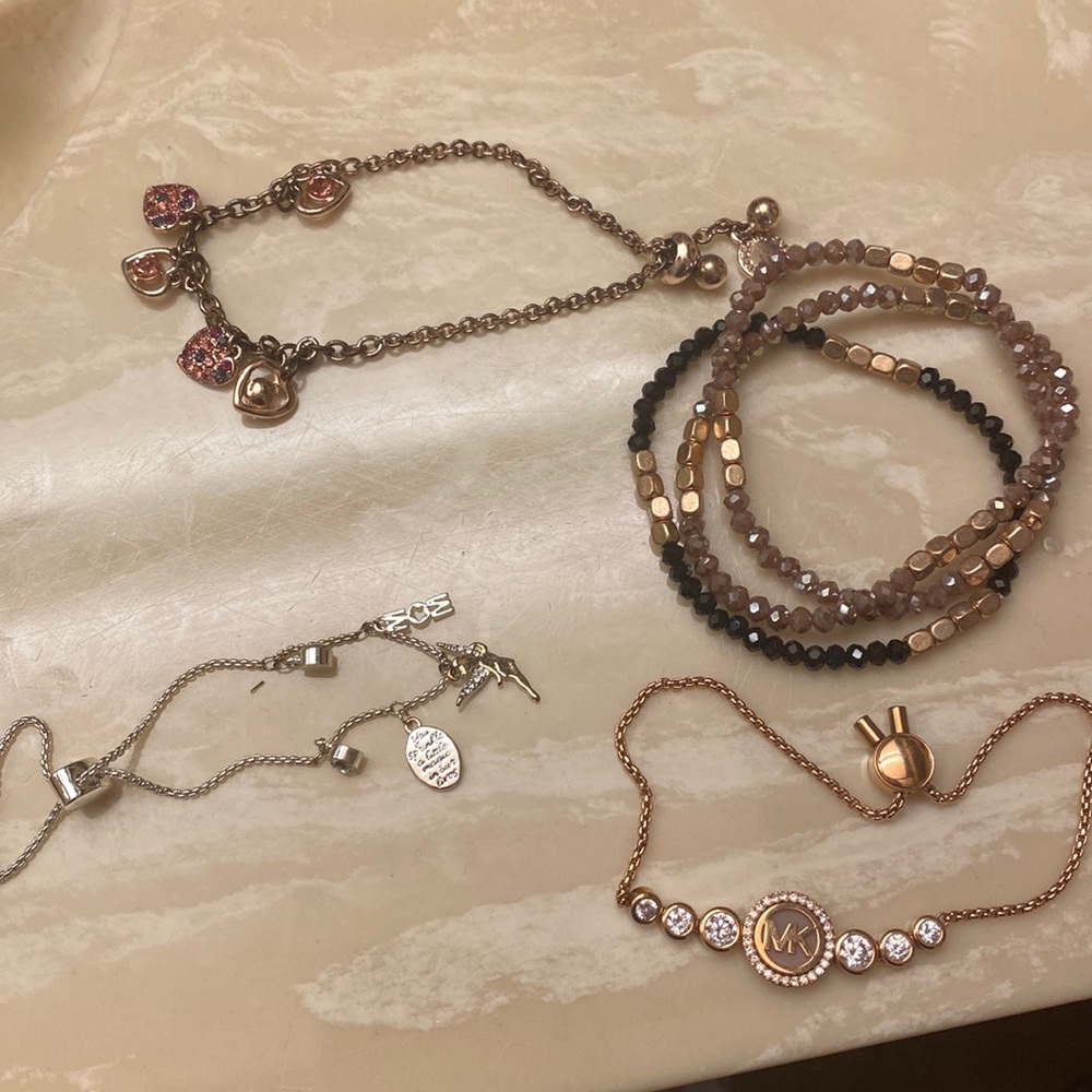 By one get one free, buy all of them for only $20 include MK bracelet